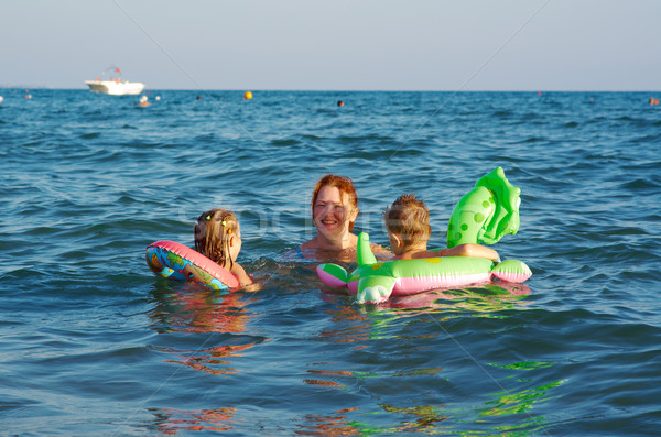 family in the waves Stock photo © fanfo