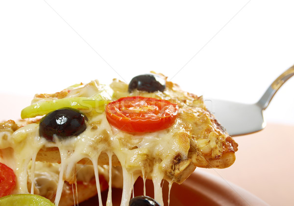 Stok fotoğraf: Dilim · peynir · ev · pizza · domates