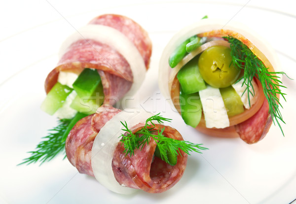 Canape platter with cheese, smoked sausage Stock photo © fanfo