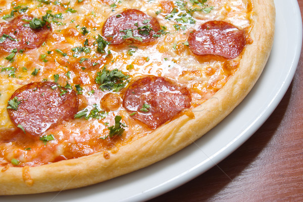 Pizza pepperoni plaka restoran peynir akşam yemeği Stok fotoğraf © fanfo