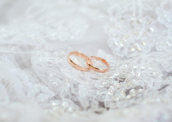 Stock photo: Golden wedding rings.