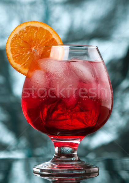red coctail drink with ice cubs   Stock photo © fanfo