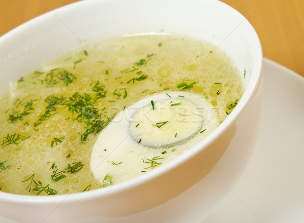 Chicken broth with dill and egg. Stock photo © fanfo