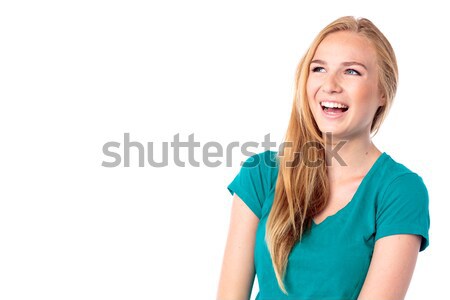 Laughing vivacious young woman Stock photo © fantasticrabbit