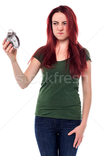 Woman glaring at her alarm clock Stock photo © fantasticrabbit