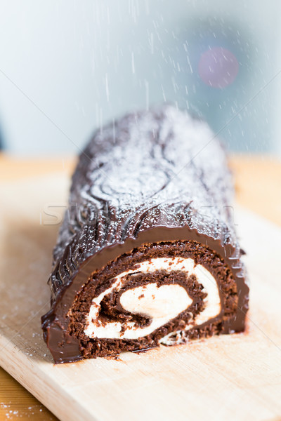 Delicious rolled cake with chocolate and cream Stock photo © fantasticrabbit