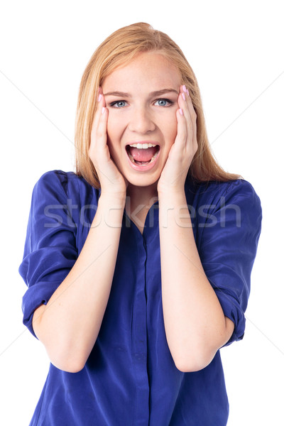 Woman reacting in amazement and shock Stock photo © fantasticrabbit