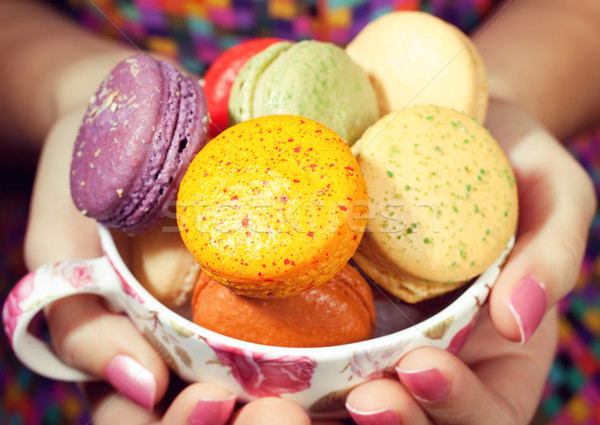 Menina colorido mulher jovem doce macaron comida Foto stock © fatalsweets