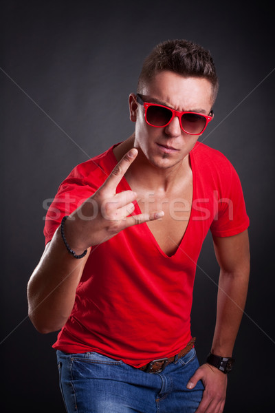 Fiatal kő férfi fiatalember nehézfém kézmozdulat Stock fotó © feedough