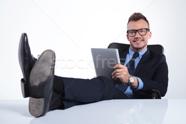 relaxed business man with tablet Stock photo © feedough
