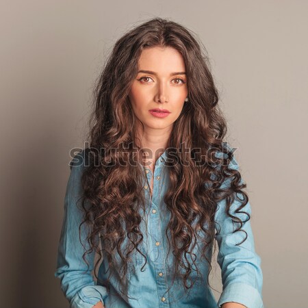 woman having her hair blown by the wind Stock photo © feedough