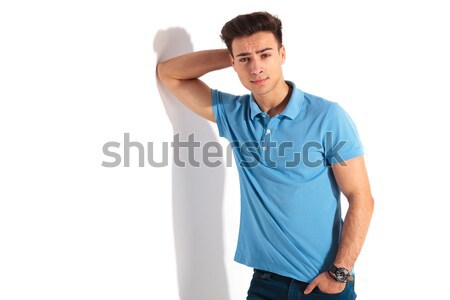  boy in blue shirt flexing and celebrating Stock photo © feedough
