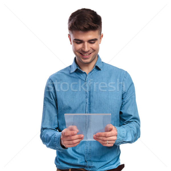 Glücklich jungen Mann halten transparent Stock foto © feedough
