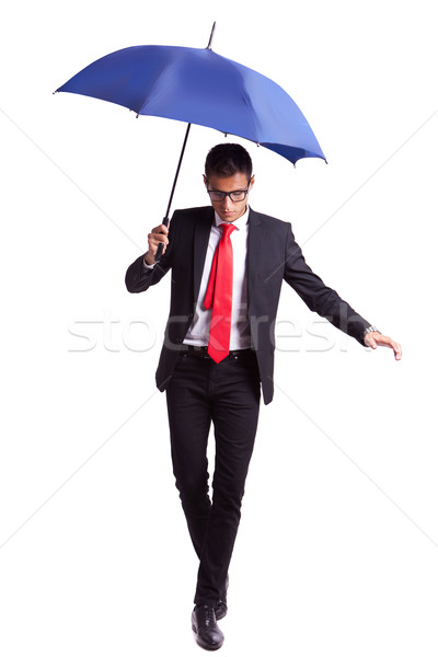 Młodych człowiek biznesu równowaga akt parasol działalności Zdjęcia stock © feedough
