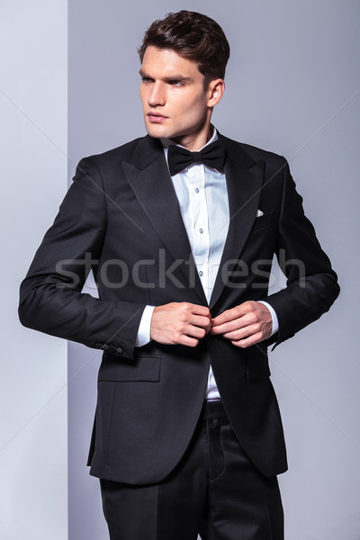 Attractive business man looking to his side Stock photo © feedough