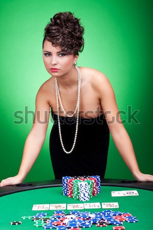 sexy lady shuffles cards Stock photo © feedough