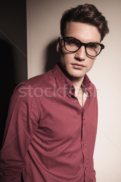 casual business man leaning on studio background  Stock photo © feedough