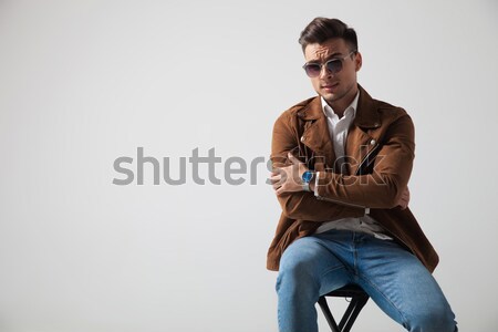 smiling fashion man sits on the floor Stock photo © feedough