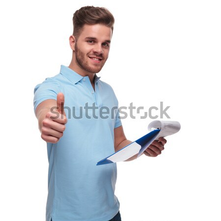 man celebrating success while working on tablet Stock photo © feedough