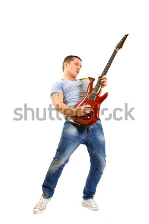 Sautant guitariste jeune homme jouer guitare électrique [[stock_photo]] © feedough