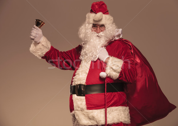 Santa Claus holding a his big bag on his shoulder Stock photo © feedough