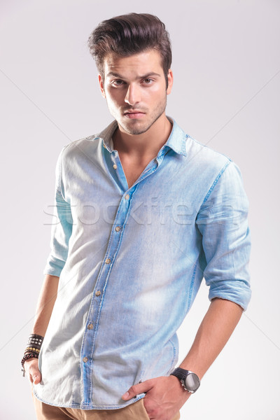 Portrait of a casual young fashion man posing  Stock photo © feedough
