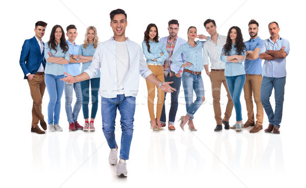 casual group leader welcomes you with open hands in team Stock photo © feedough