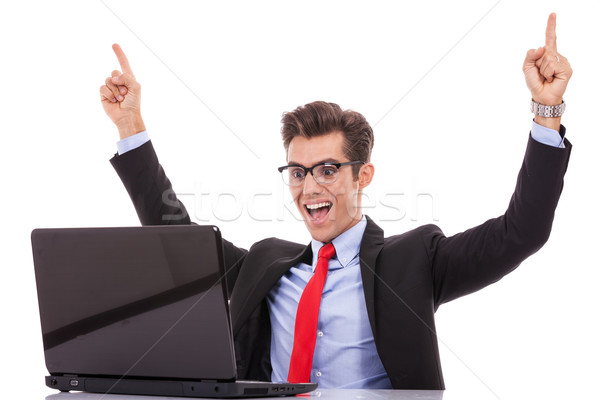 winning business man at his desk  Stock photo © feedough