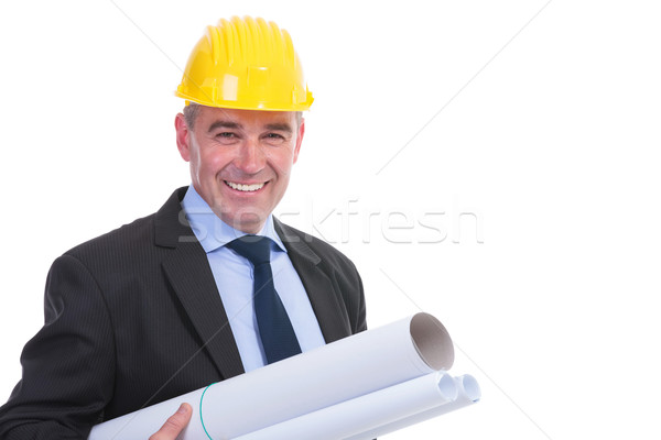 old engineer holds some projects Stock photo © feedough