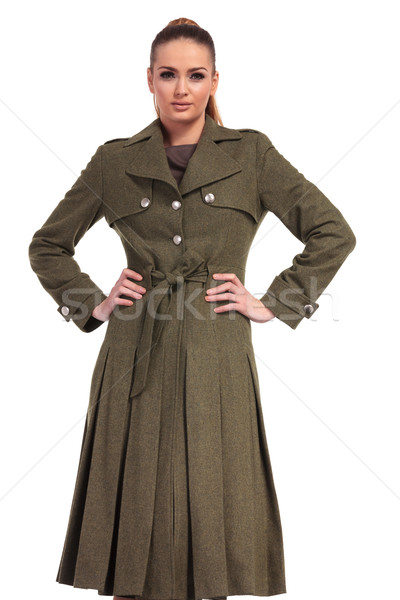 young business woma wearing a long elegant coat Stock photo © feedough