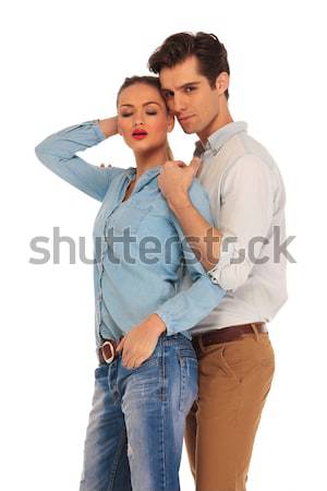 woman in green dress leaning elbow on man's shoulder Stock photo © feedough