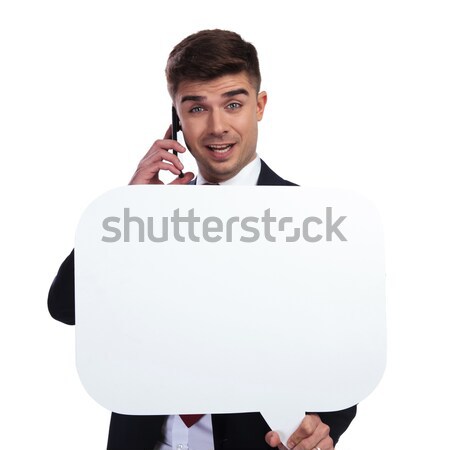 shocked businessman speaking on the phone while holding speech b Stock photo © feedough
