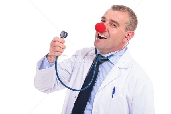 Faux médecin chanter chanson stéthoscope rouge [[stock_photo]] © feedough