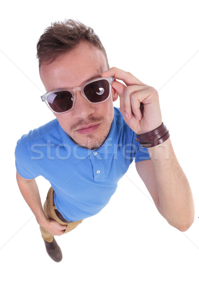 Lezser fiatalember napszemüveg felső kilátás tart Stock fotó © feedough