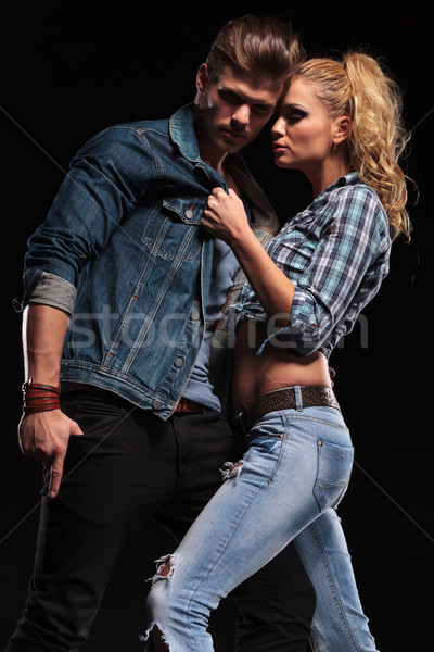 Woman pulling her boyfriend close to her Stock photo © feedough
