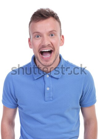 surprised casual young man Stock photo © feedough