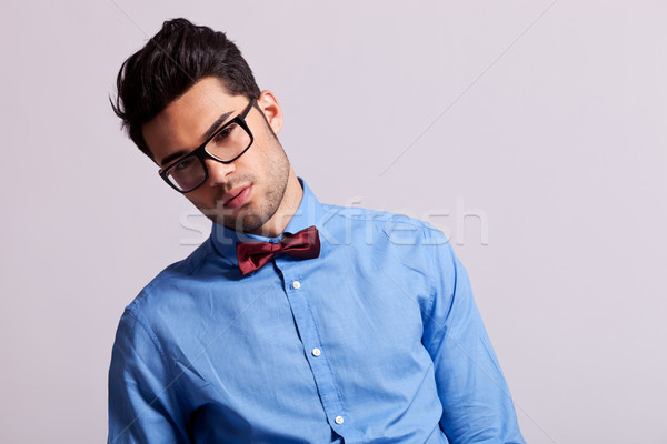 fashion young man wearing glasses and bow tie Stock photo © feedough
