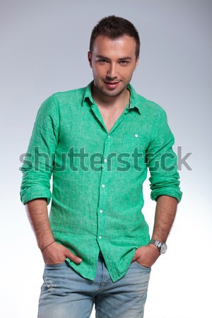 Stock photo: casual man with fingers in pockets