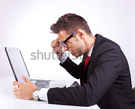 Człowiek biznesu drzemka laptop młodych głowie Zdjęcia stock © feedough