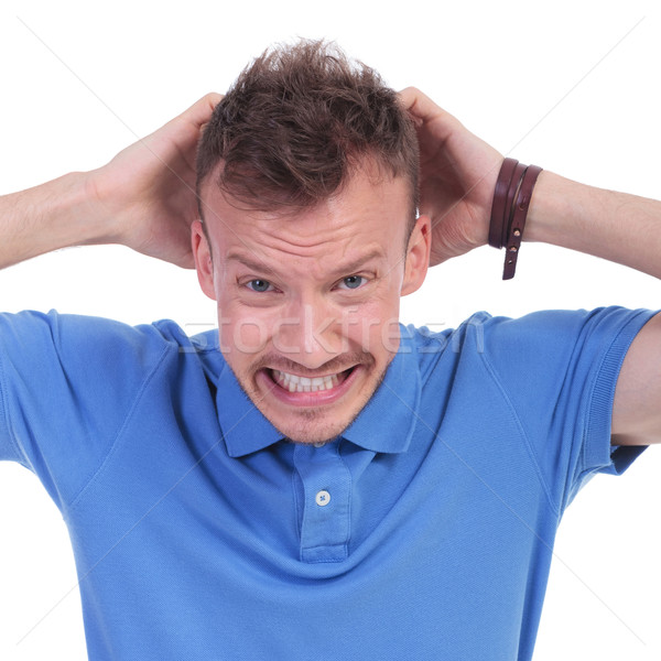 Stock photo: casual young man is furious