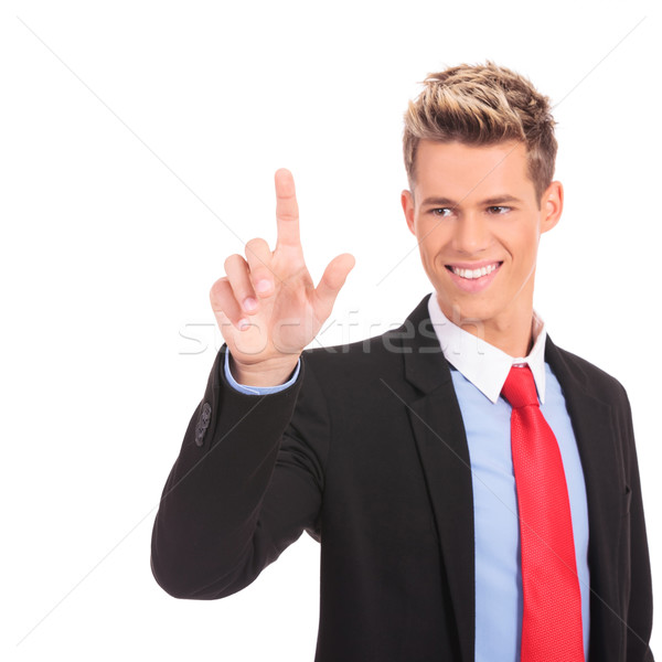 businessman pushing an imaginary button Stock photo © feedough