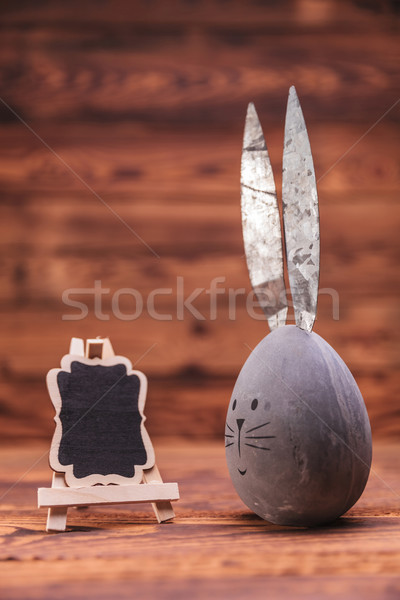 grey easter egg with bunny ears near blank board  Stock photo © feedough