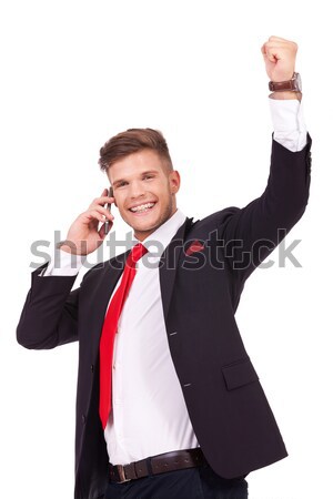 business man on phone cheers Stock photo © feedough
