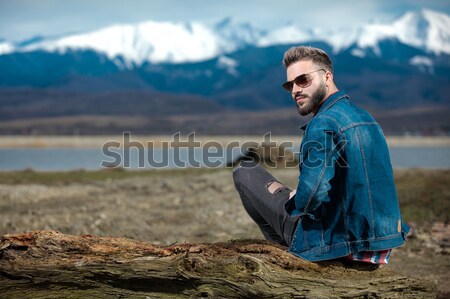 outdoor fashion man looks away, smoking Stock photo © feedough
