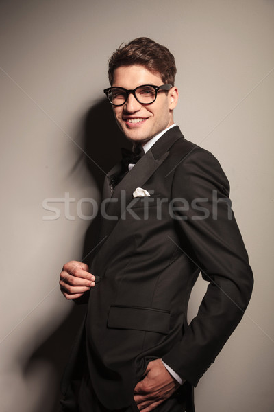 business man holding one hand in his pocket. Stock photo © feedough