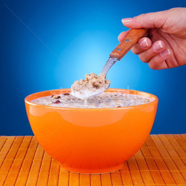 woman holding a spoon with cereal  Stock photo © feedough