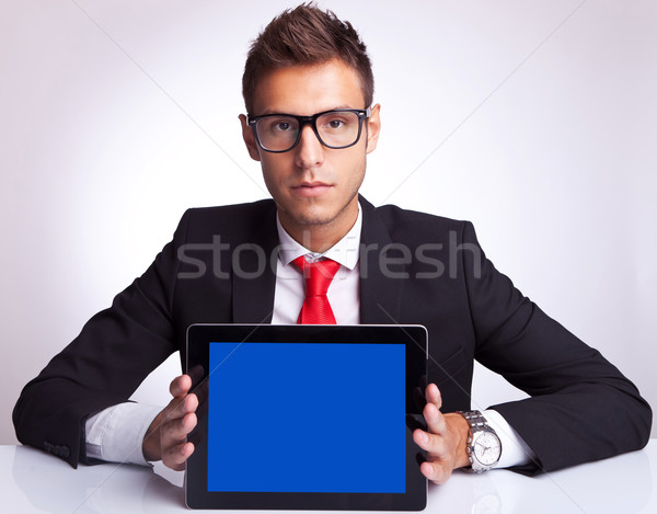 business man showing an electronic pad Stock photo © feedough