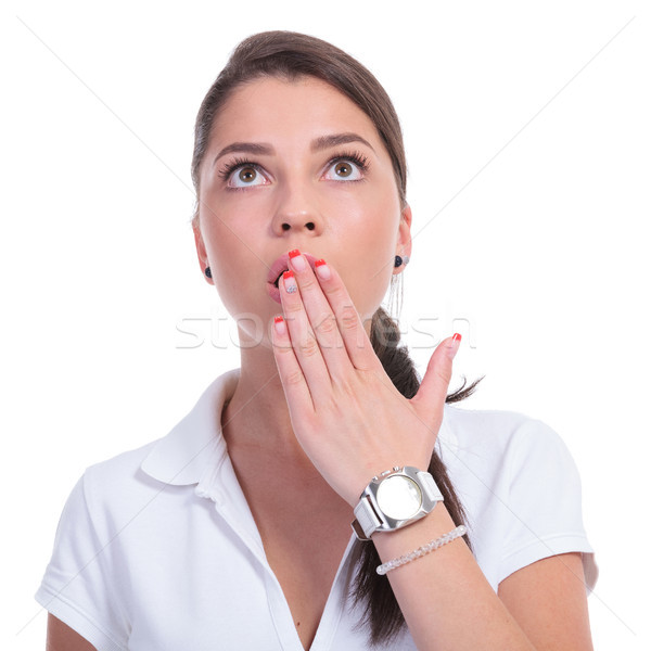 casual woman looks up surprised Stock photo © feedough