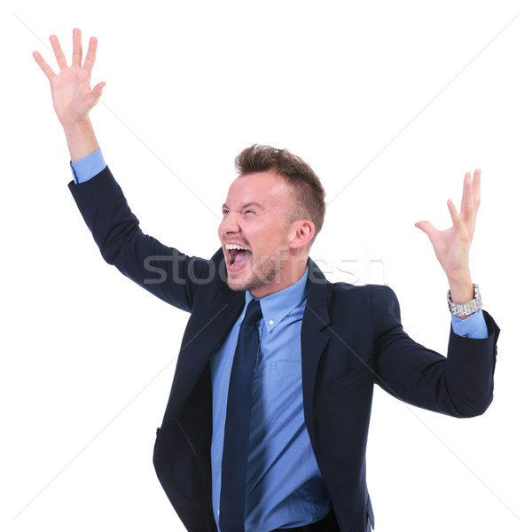 business man shouts with hands in air Stock photo © feedough