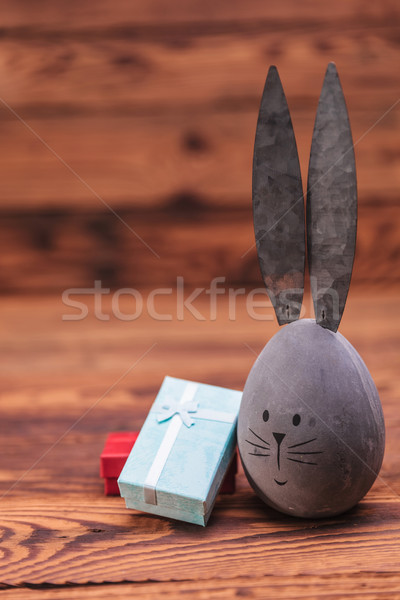 cute easter egg with bunny ears near gift boxes Stock photo © feedough